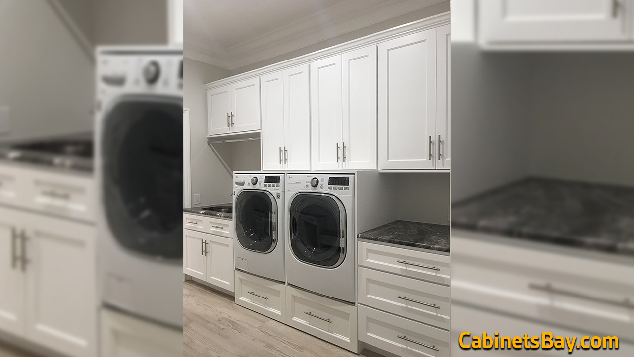 laundry room with Chester White Ready to Assemble Cabinets 
